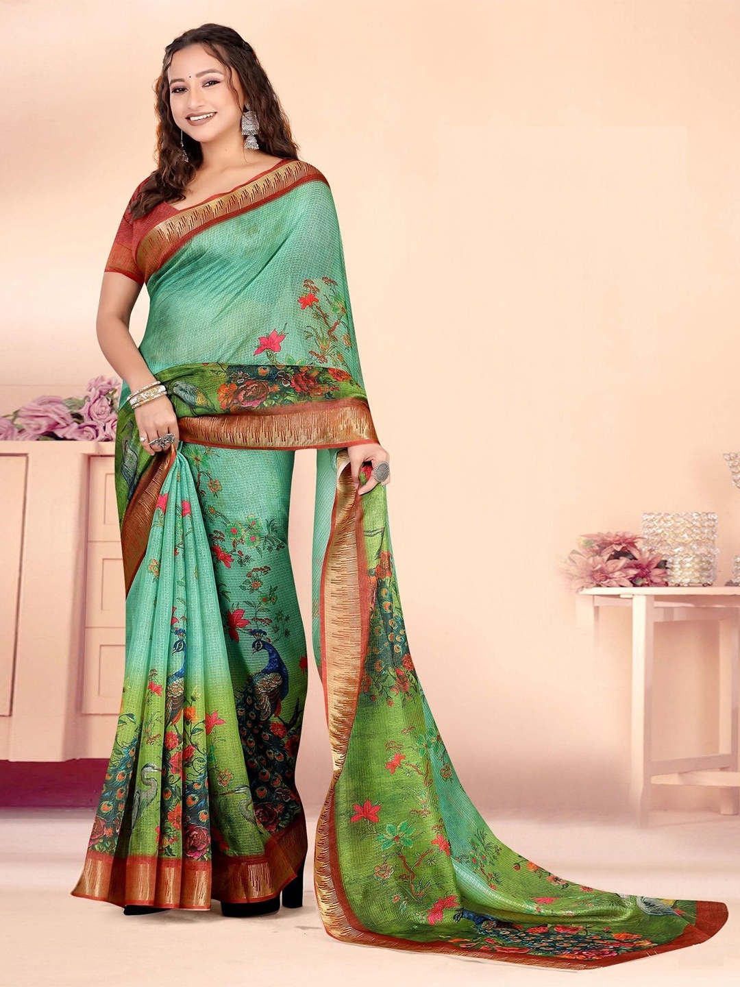 

Jaanvi Ethnic Motifs Printed Zari Woven Design Saree, Green