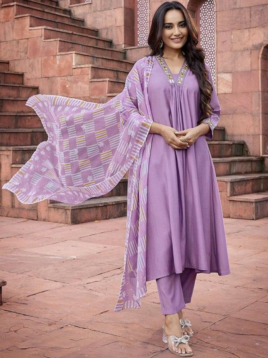 

Ariya Prints Women Yoke Design Pleated Mirror Work Kurti with Trousers & With Dupatta, Purple