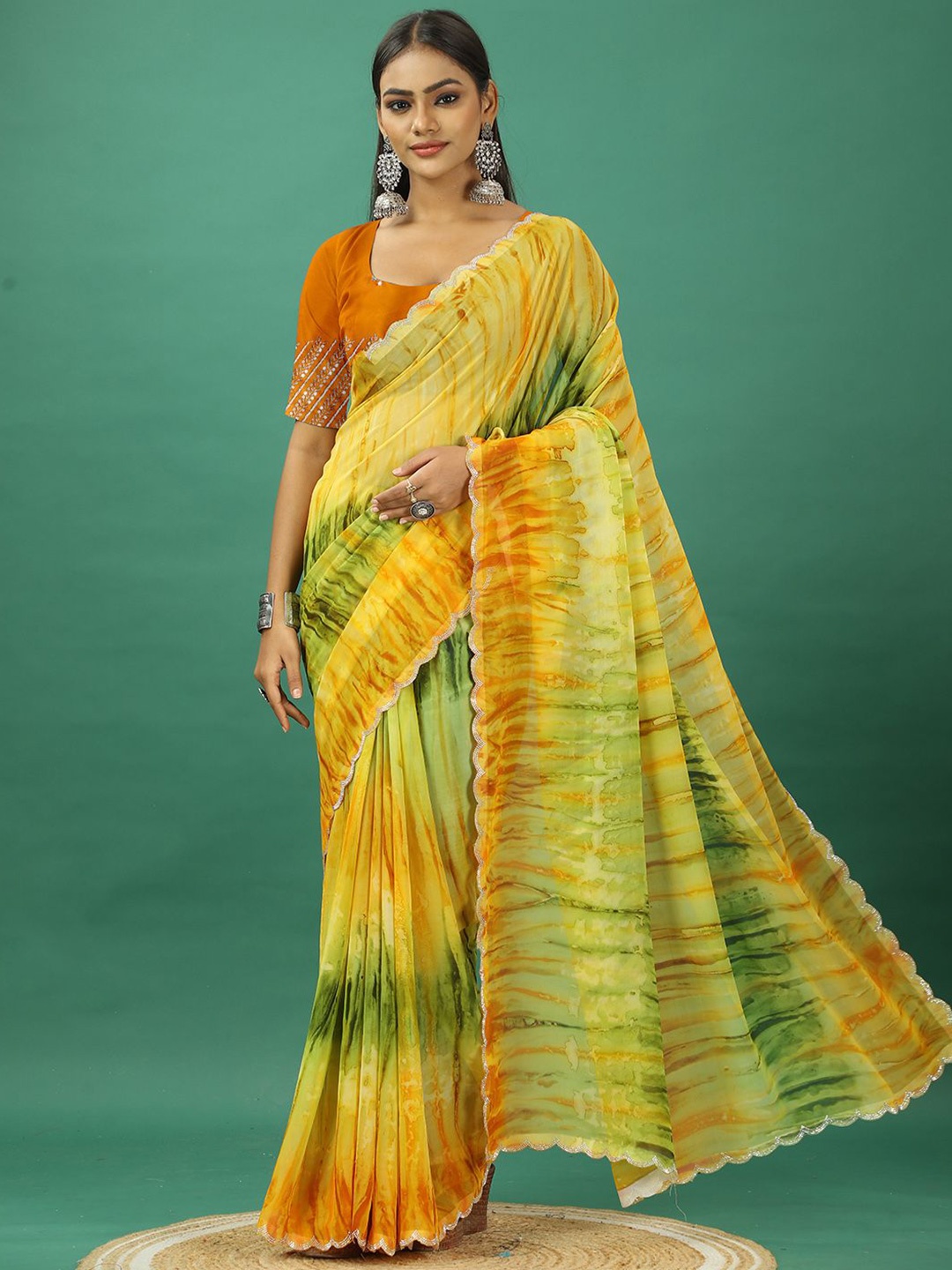 

A.V.M. SILK MILLS Tie and Dye Pure Georgette Saree, Metallic