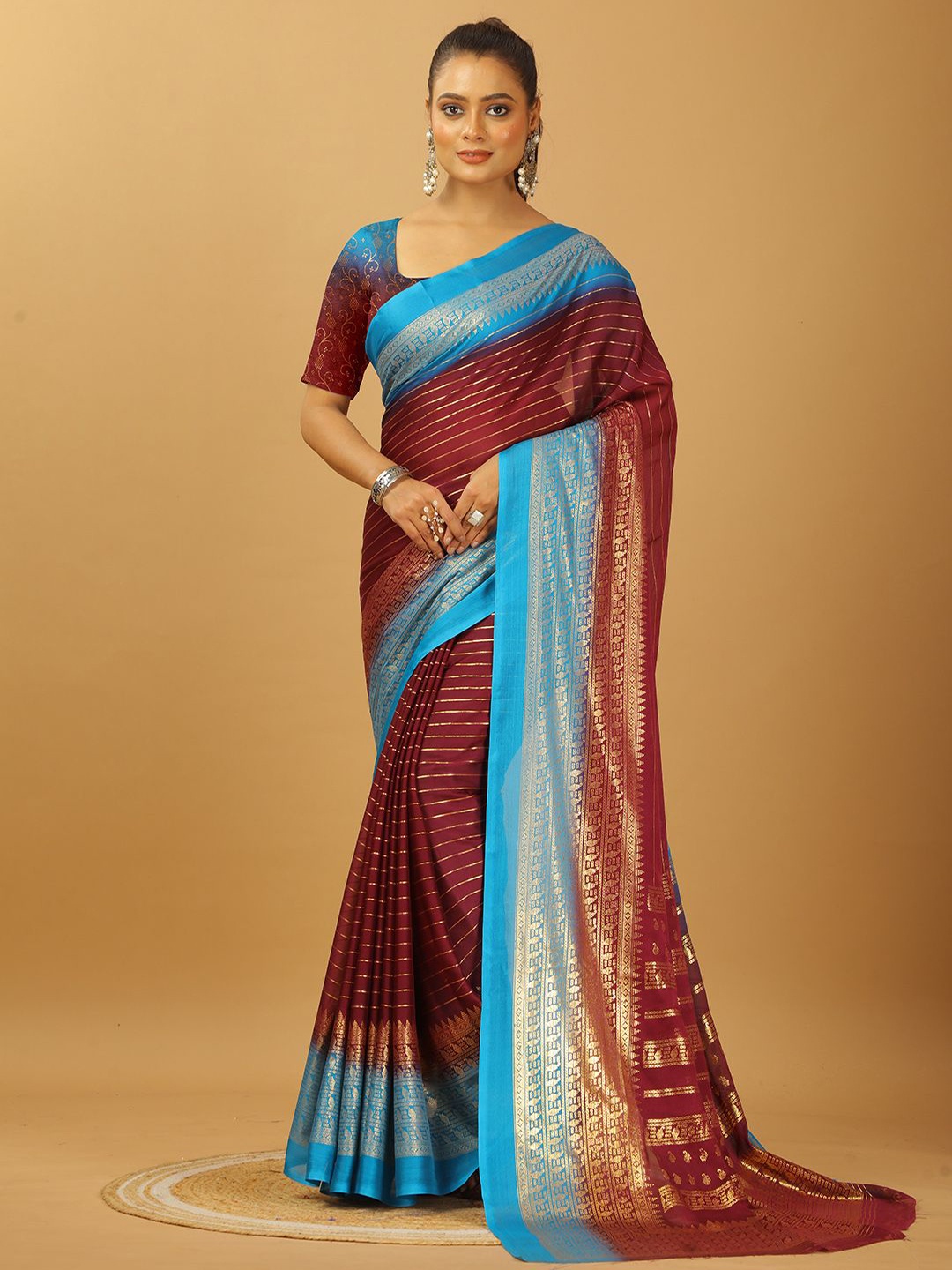 

A.V.M. SILK MILLS Woven Design Zari Pure Crepe Saree, Burgundy