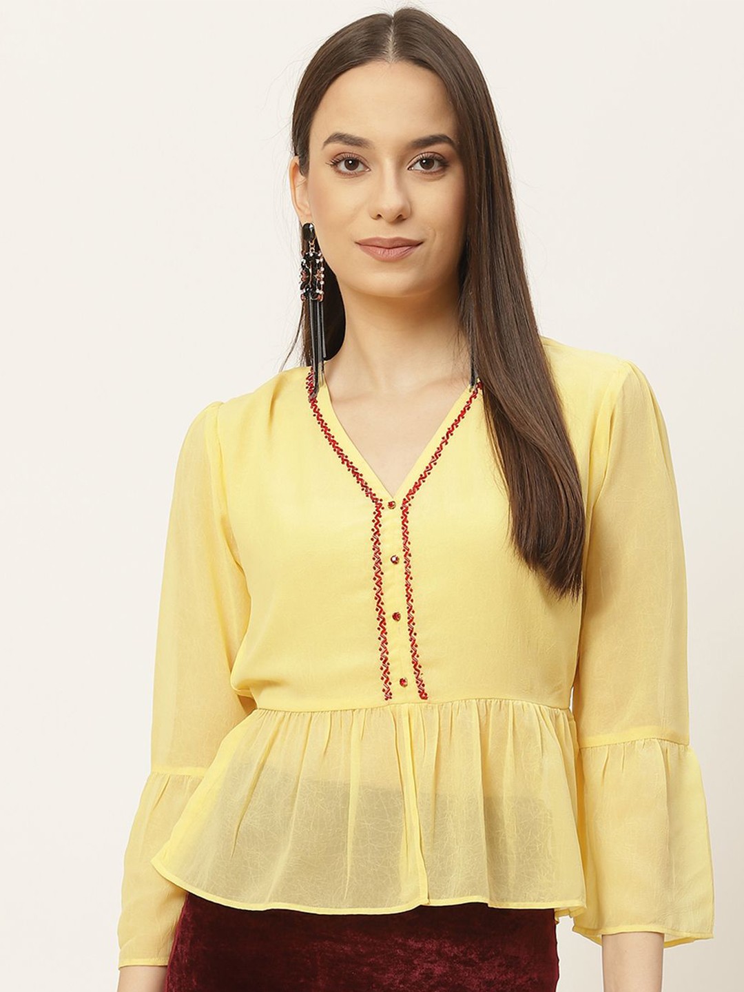 

Moda Rapido Women Embellished Bell Sleeve Peplum Top, Yellow