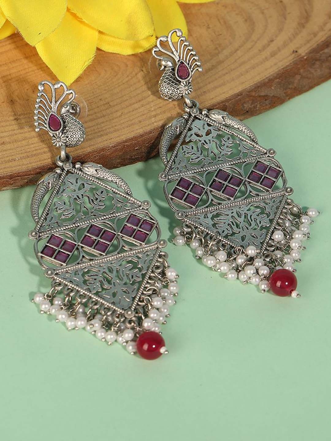 

Anouk Pink Silver-Plated Artificial Beaded Peacock Shaped Drop Oxidized Earrings