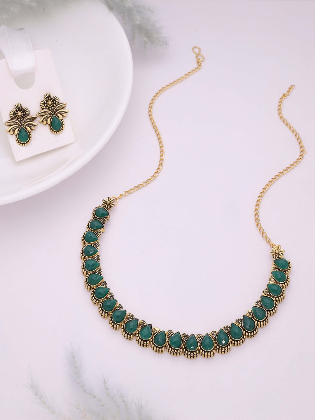 

Lyriss Gold-Plated Artificial Stone Studded Jewellery Set