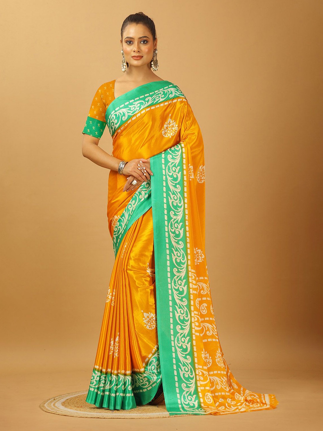 

A.V.M. SILK MILLS Ethnic Motifs Printed Pure Crepe Saree, Yellow