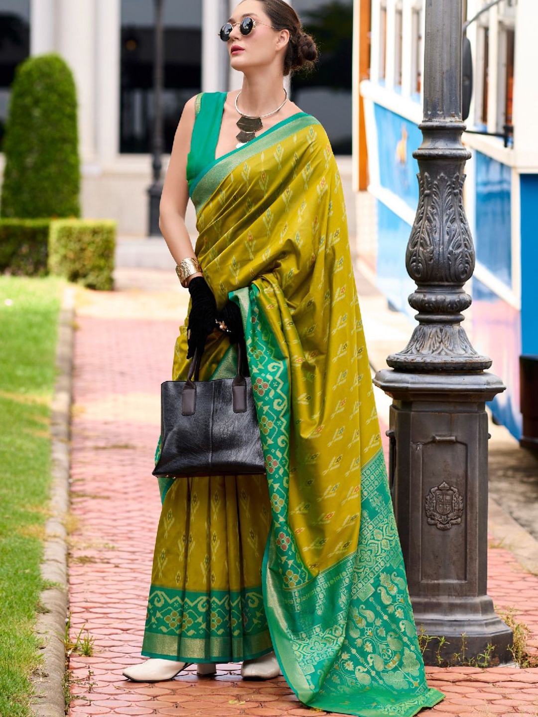 

Mitera Woven Design Zari Saree, Green