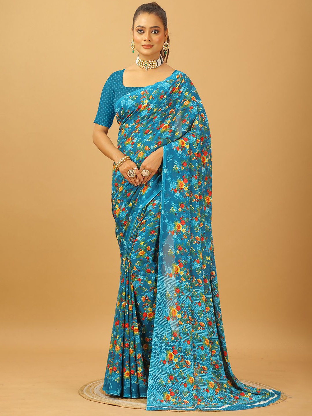 

NIRMAL CREATION Floral Printed Pure Georgette Saree, Turquoise blue