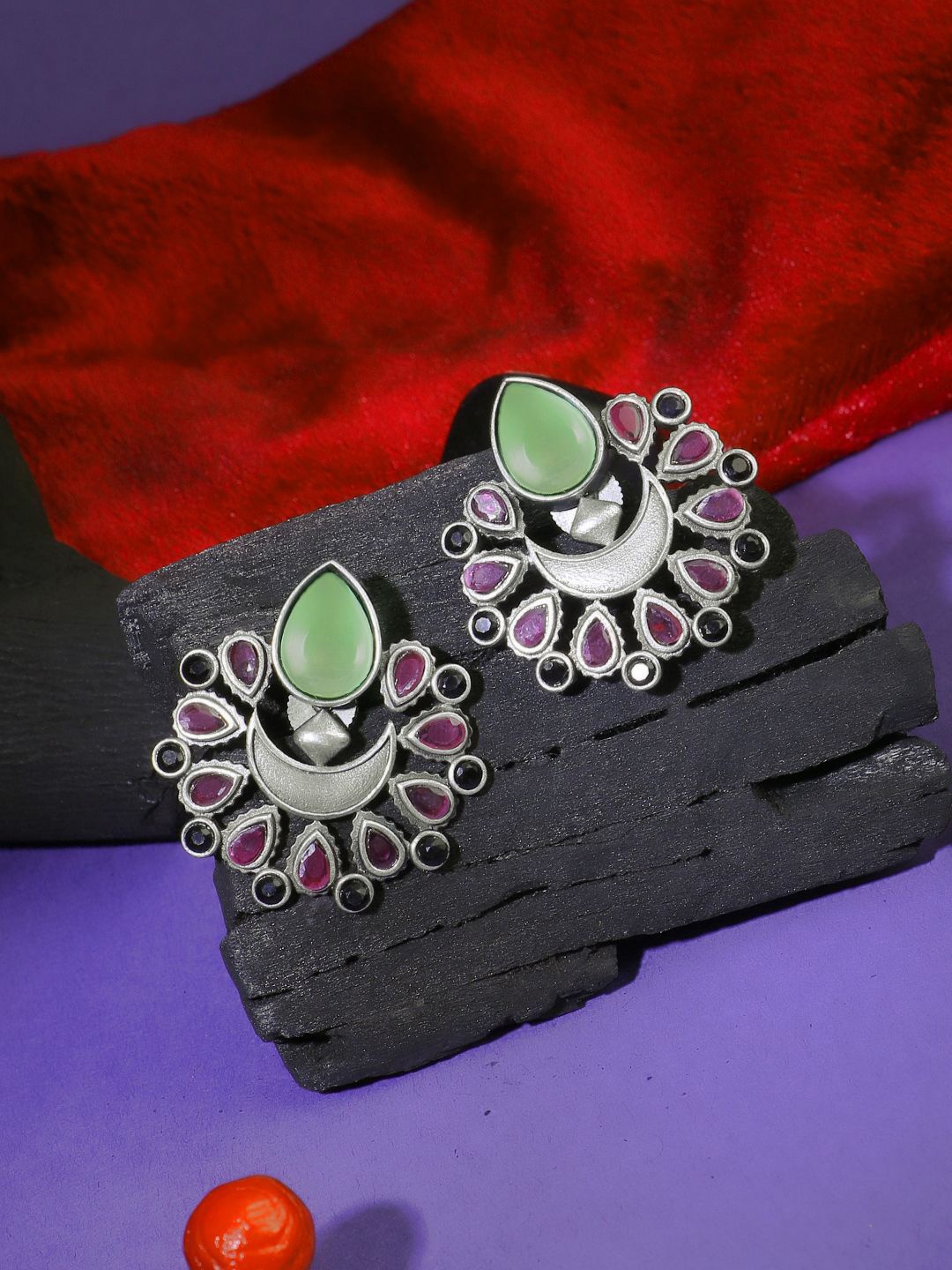 

Sangria Green Silver-Plated Artificial Stones Studded Contemporary Oxidised Studs