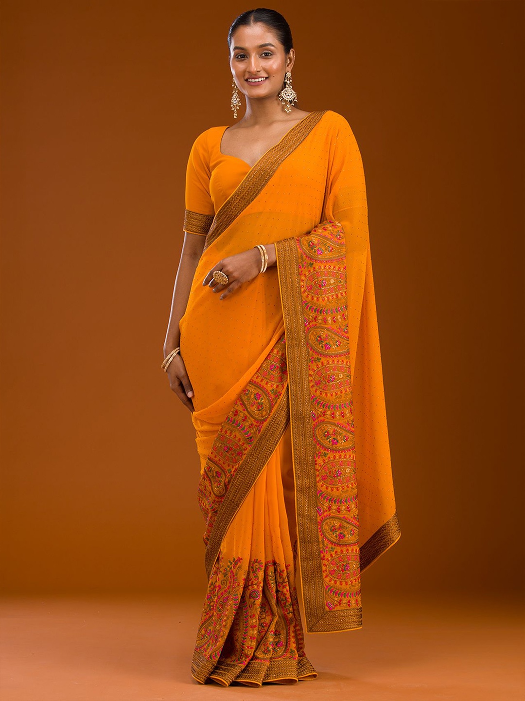 

Koskii Embellished Embroidered Mustard Threadwork Georgette Saree