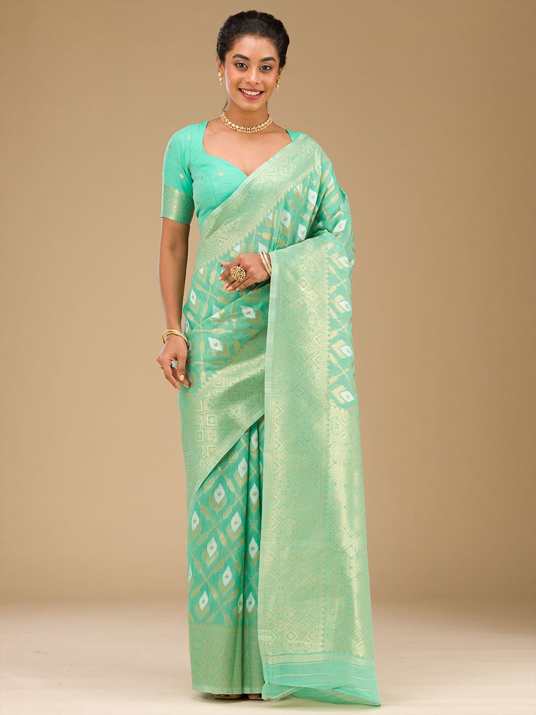 

Koskii Sea Green Zari Work Art Silk Saree