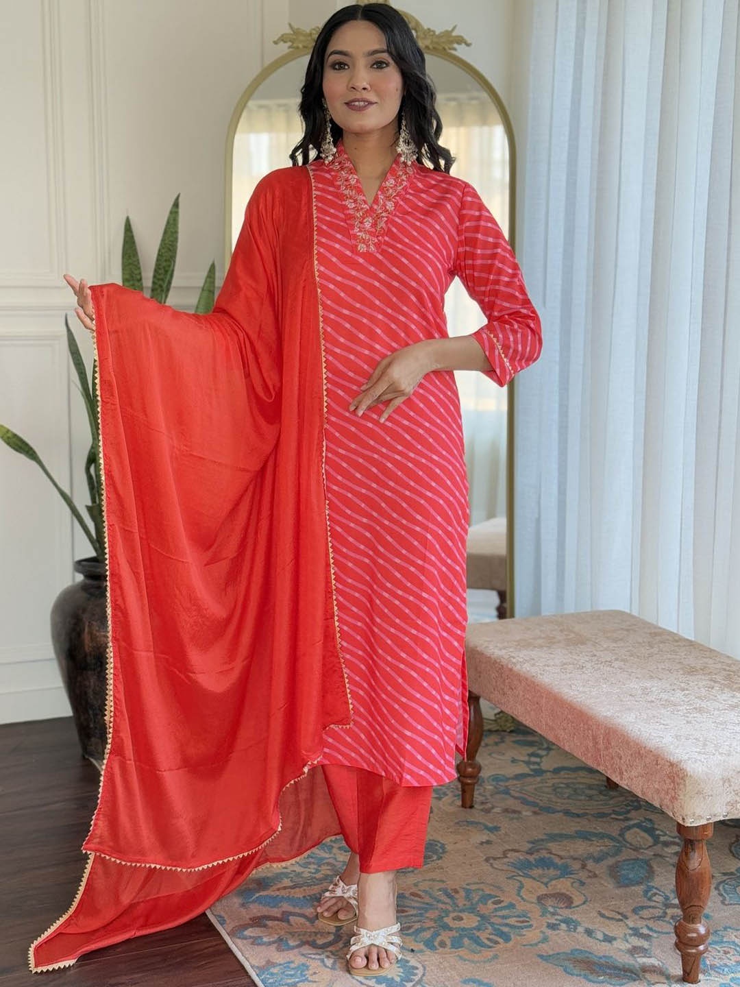 

REALLTREND Leheriya Printed V-Neck Sequinned Straight Kurta With Trousers And Dupatta, Orange