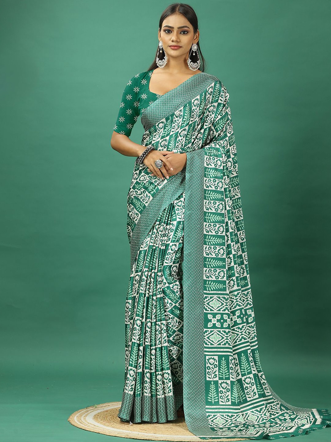 

NIRMAL CREATION Ethnic Motifs Printed Pure Crepe Saree, Turquoise blue