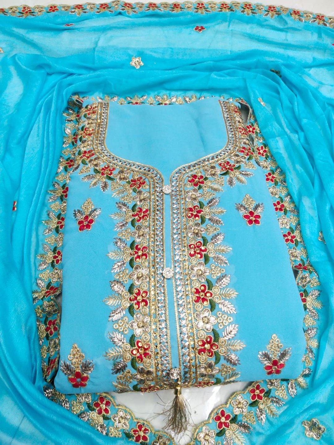 

SWARNGANGA TEX Floral Embroidered Beads And Stones Georgette Unstitched Dress Material, Blue