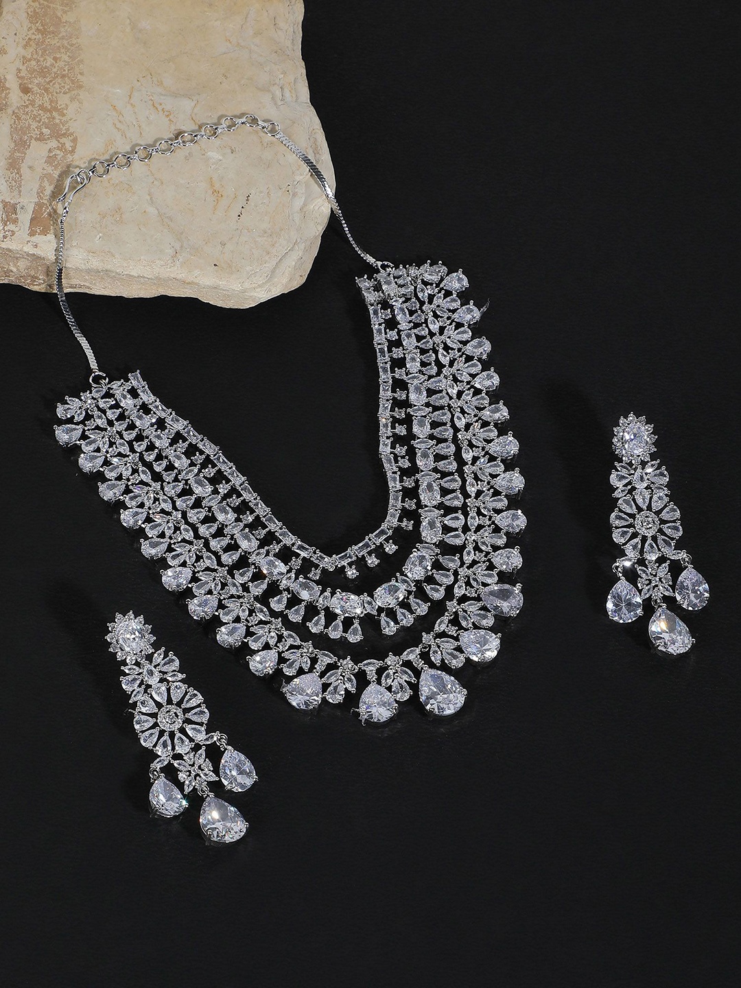 

AURAA TRENDS Silver-Plated American Diamond Studded Layered Jewellery Set