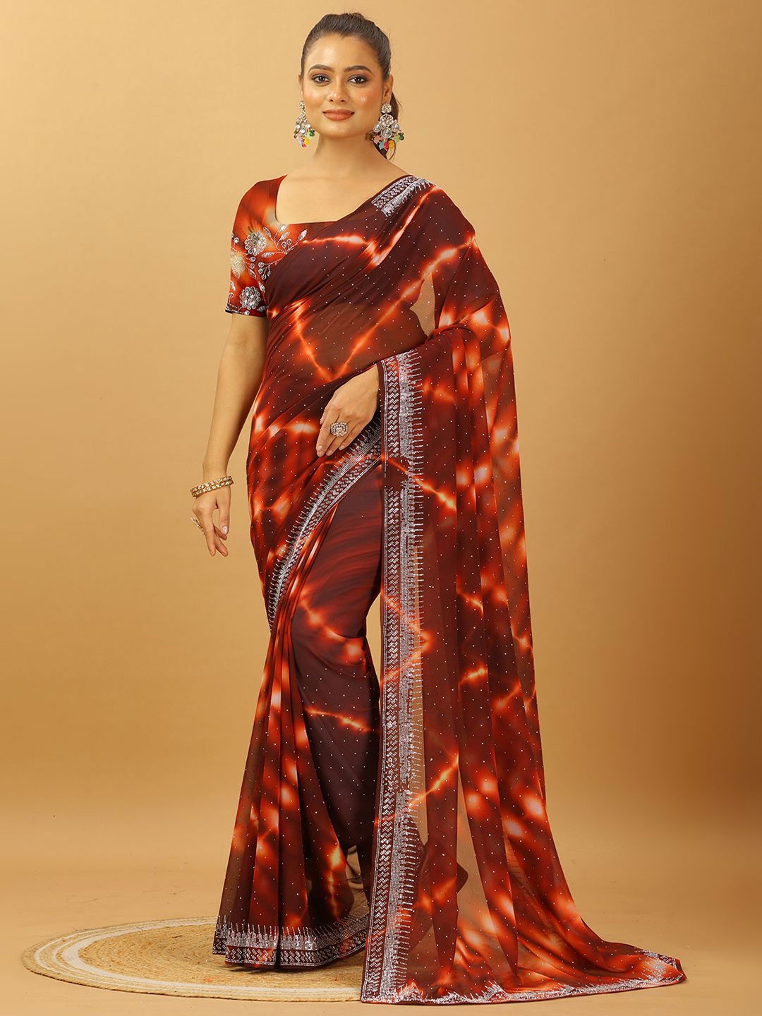 

A.V.M. SILK MILLS Tie and Dye Embroidered Pure Georgette Saree, Rust