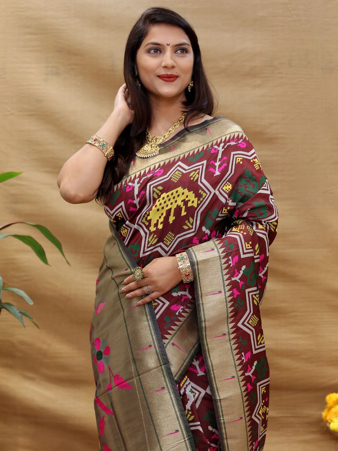 

amirat Ethnic Motifs Woven Design Zari Pure Silk Patola Saree, Maroon