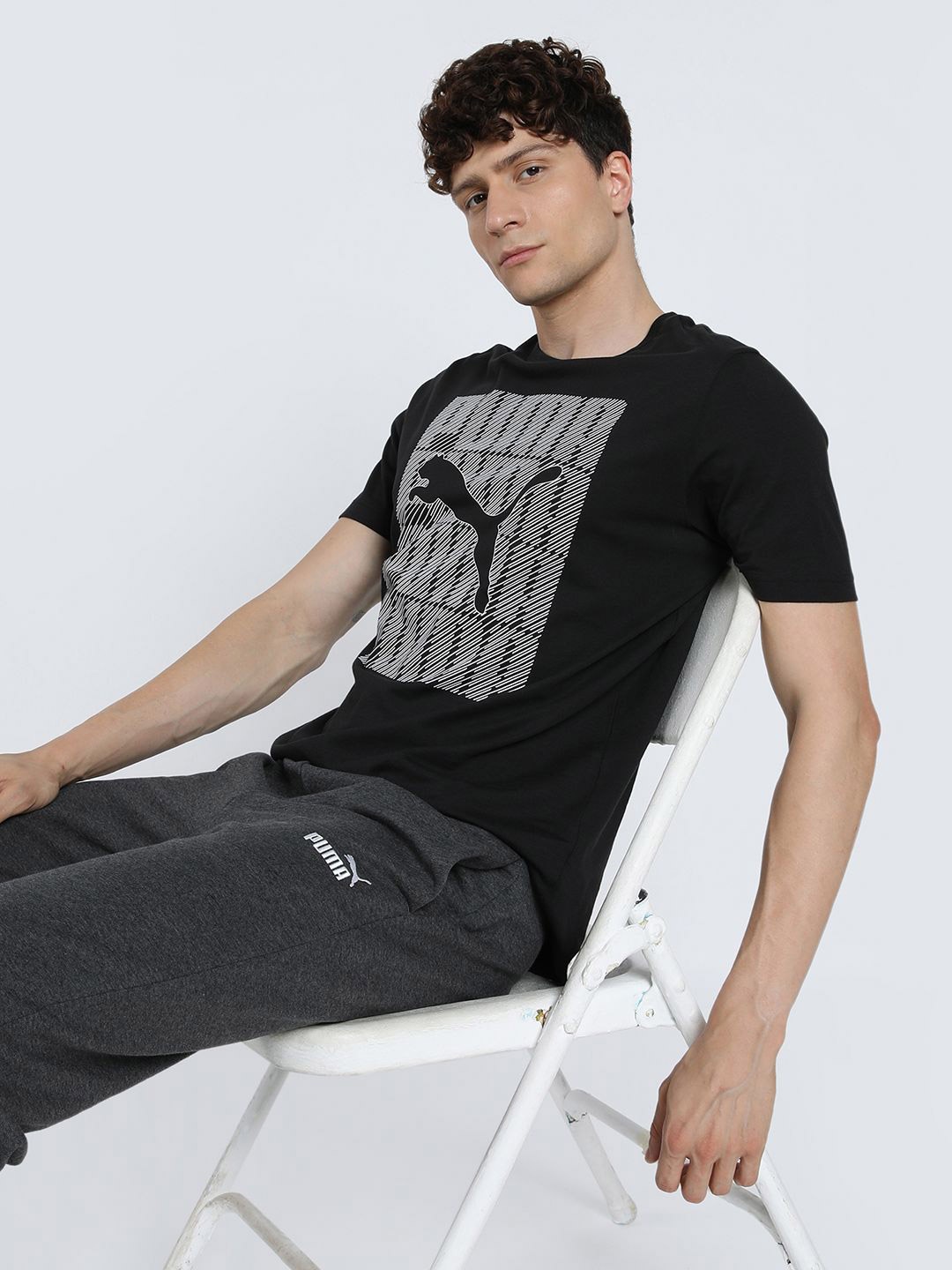 

Puma Men Graphics Printed Pure Cotton T-Shirt, Black