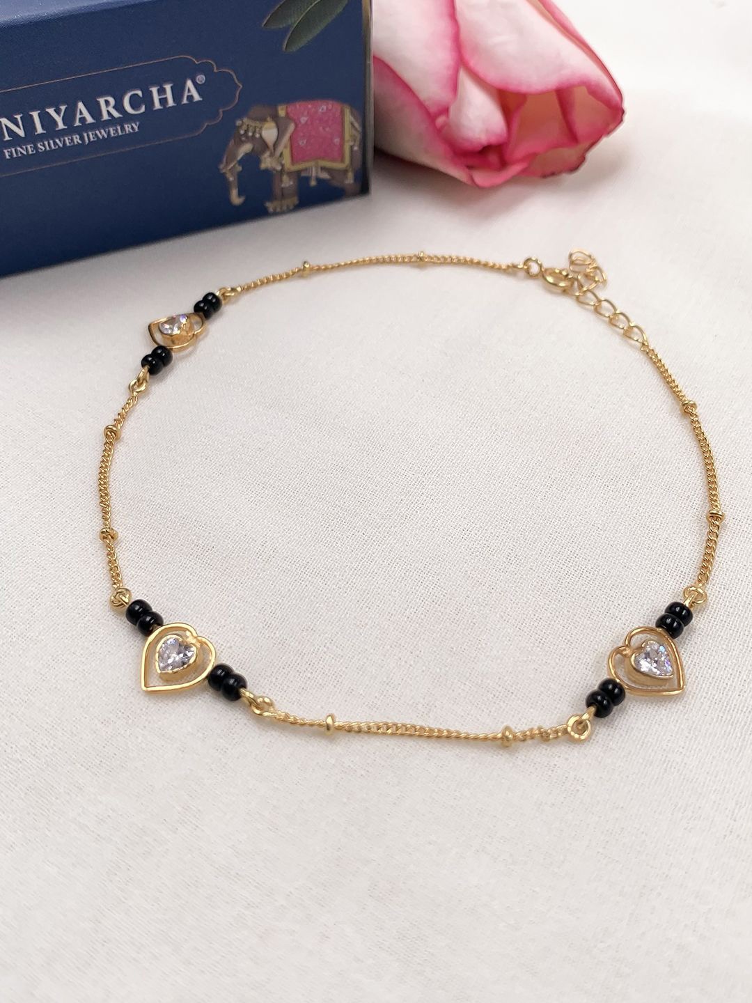 

Unniyarcha 92.5 Silver Gold-Plated Stones Studded & Beaded Mangalsutra Heart-shaped anklet