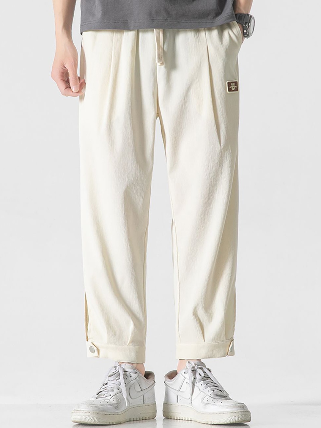 

StyleCast x Revolte Men Easy Wash Cotton Loose Fit Trousers, Off white