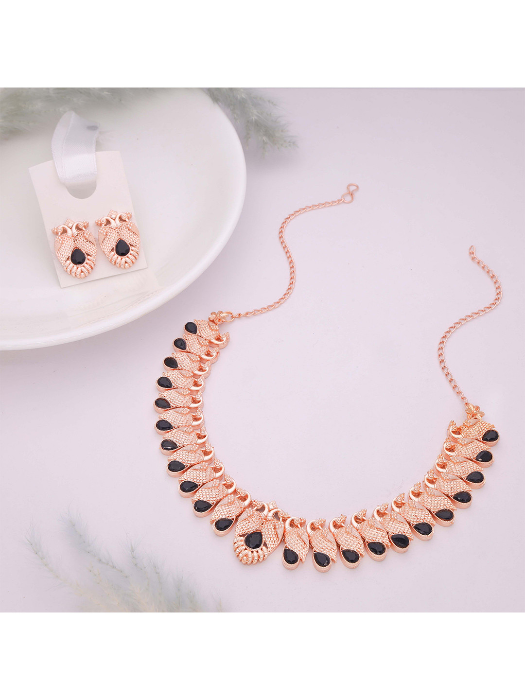 

Lyriss Rose Gold-Plated American Diamond Stone-Studded Jewellery Set