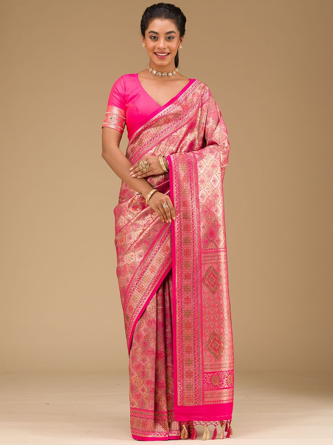 

Koskii Rani Pink Swarovski Raw Silk Saree