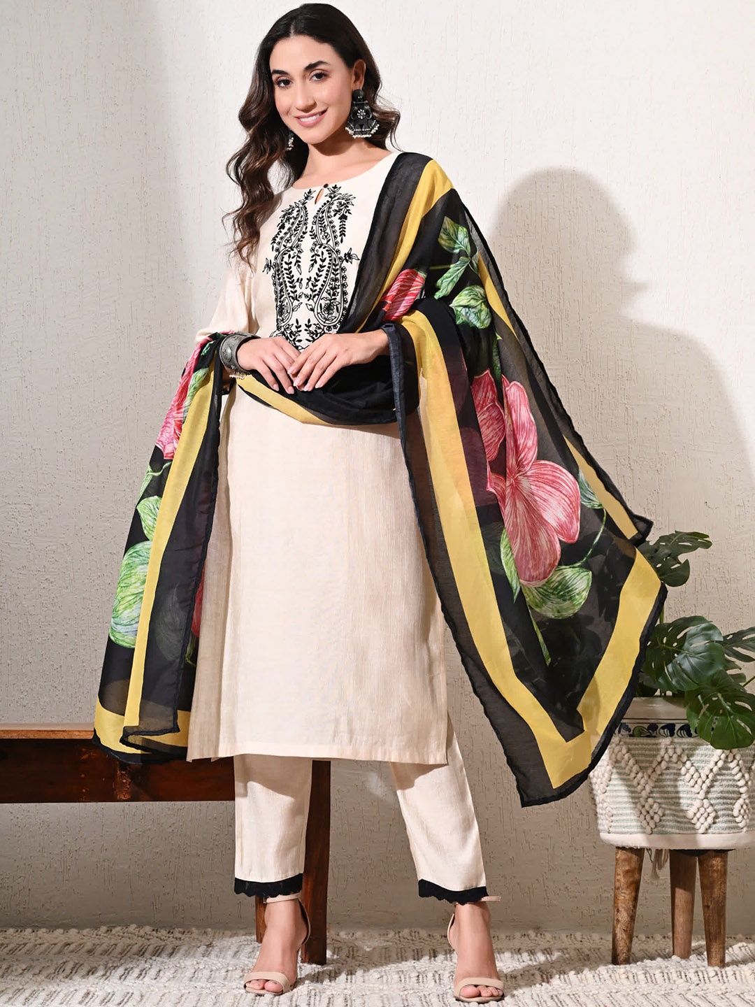 

Sangria Black Ethnic Motifs Yoke Design Thread Work Kurta With Trousers And Dupatta, Beige