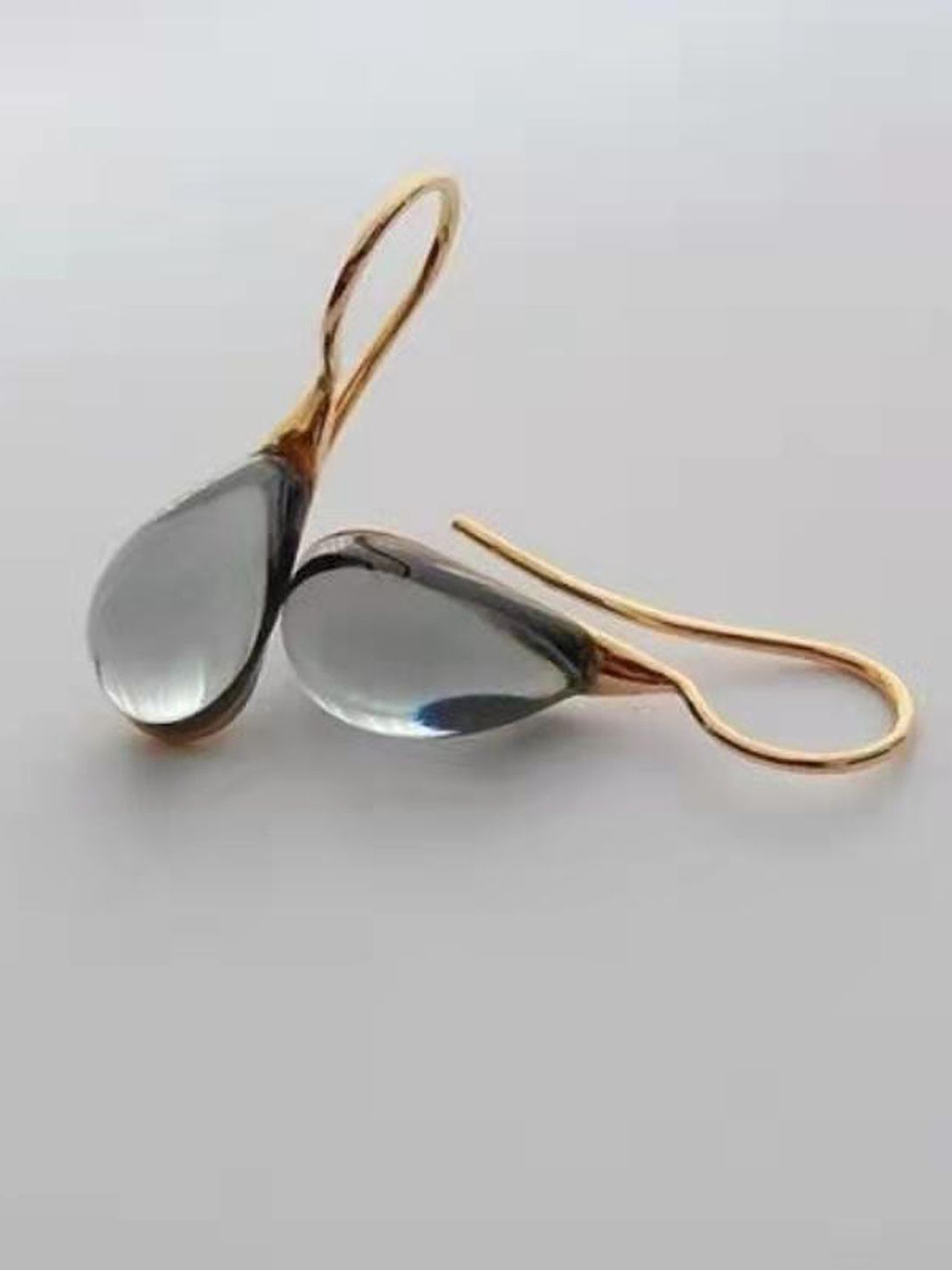 

Just Lil Things Gold-Plated Artificial Stones Studded Contemporary Drop Earrings