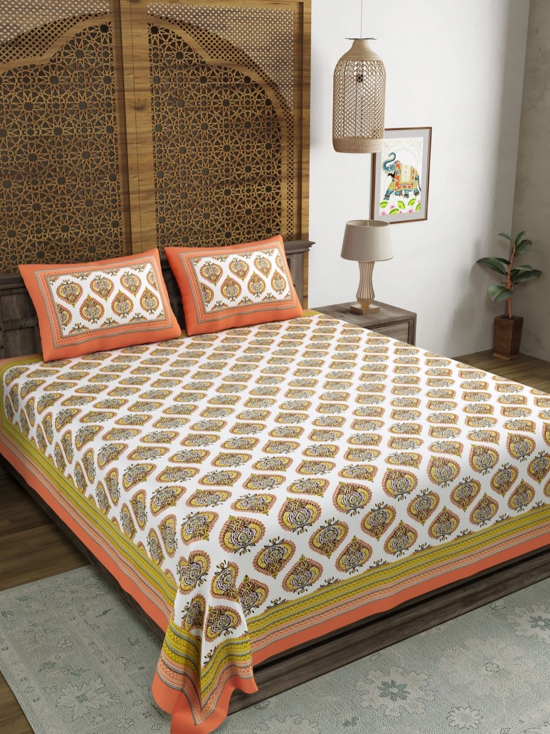 

Myntra Elegant Homes Orange Floral Printed 180 TC King Bedsheet Set 2.28 m x 2.74 m, White