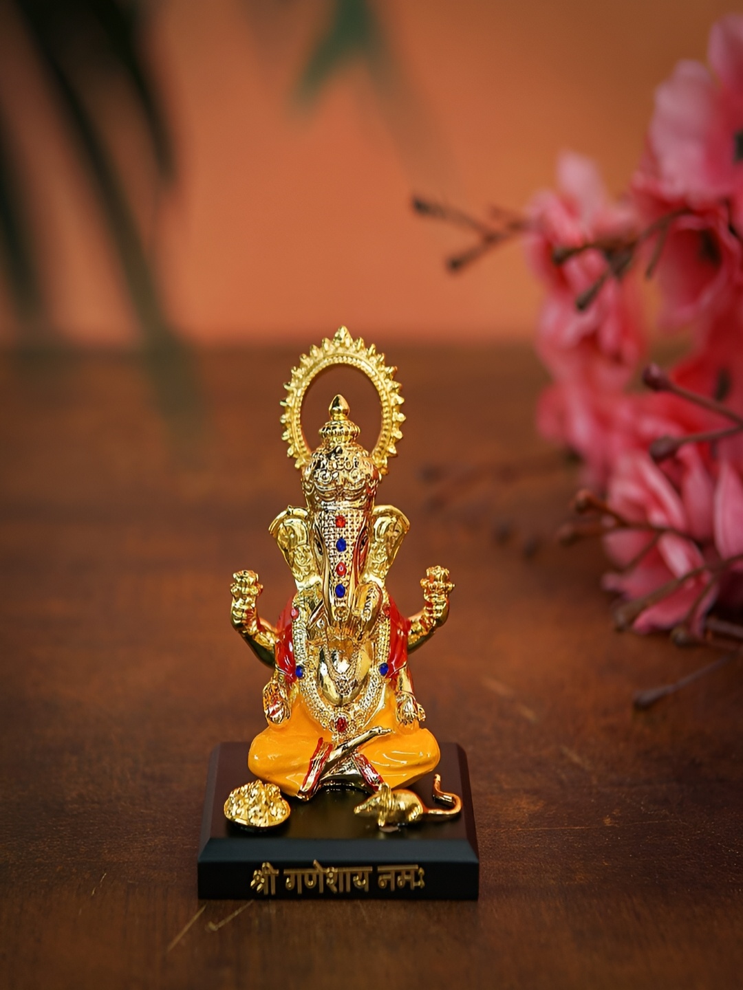 

Craftlayout Gold Toned & Yellow Ganesha Ji Religious Idol Showpiece