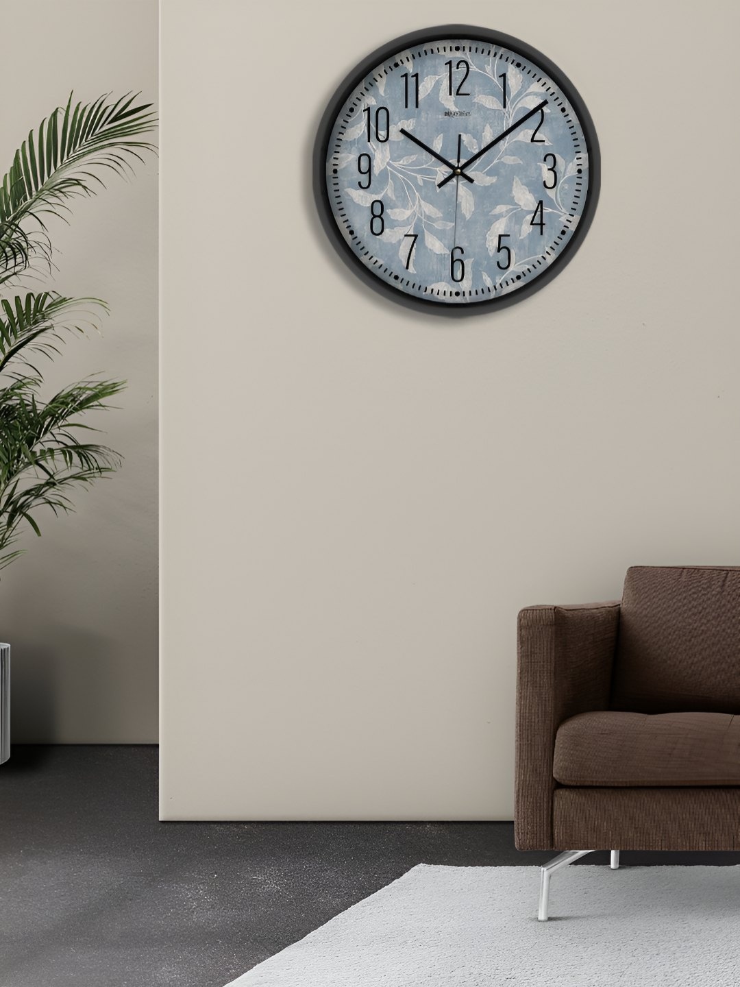 

OLIVE TREE Black & Blue Printed Round Shaped Contemporary Analogue Wall Clock