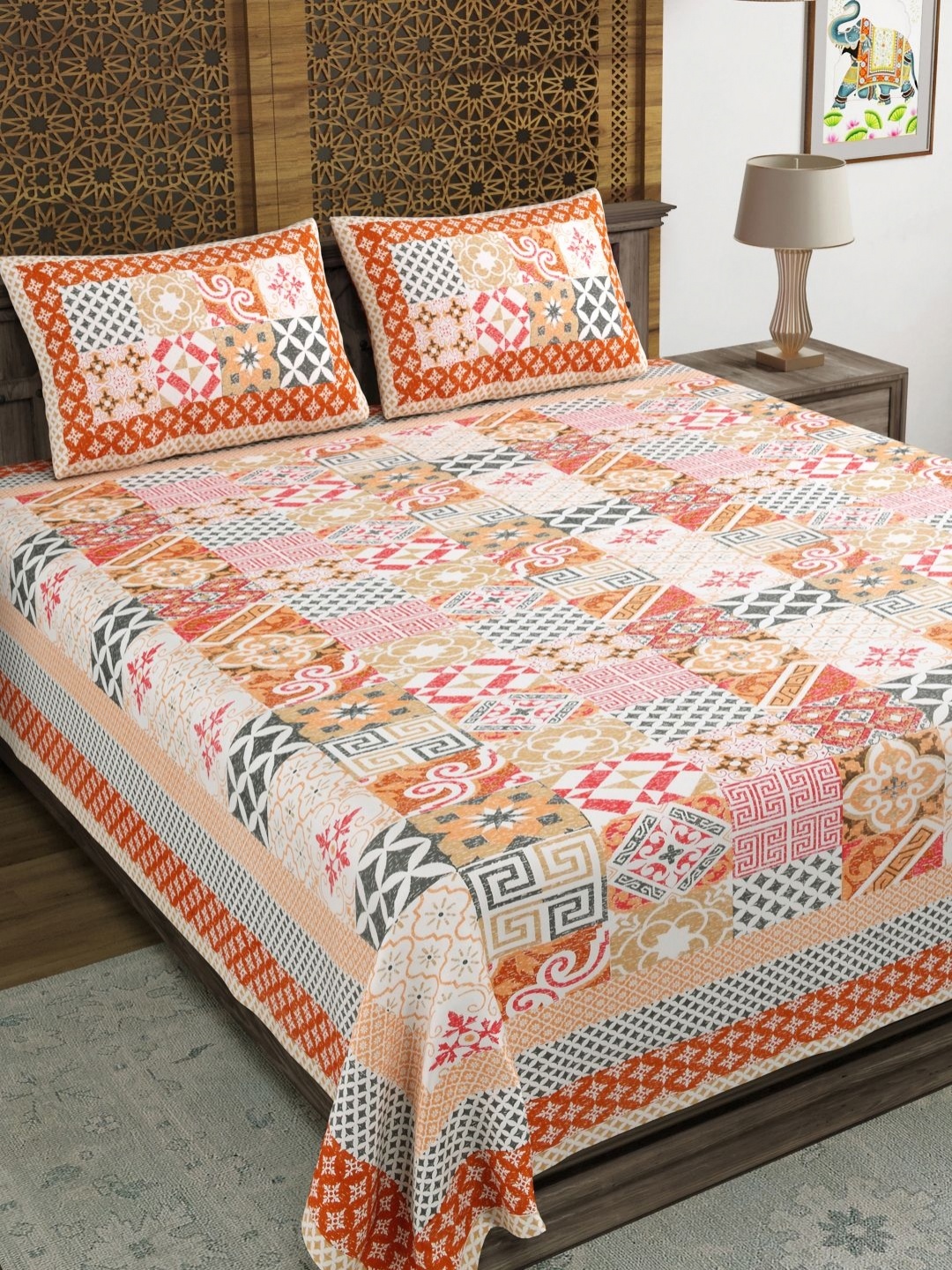 

Myntra Elegant Homes Orange Floral Printed 180 TC Cotton King Bedsheet Set 2.28 m x 2.74 m