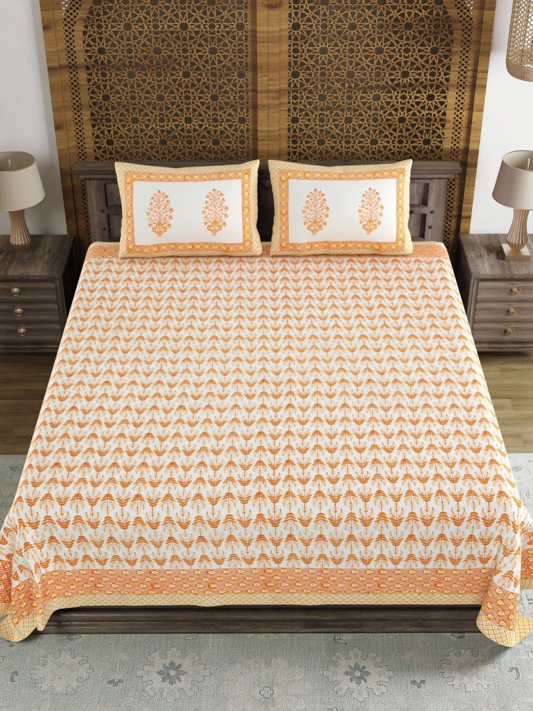 

Myntra Elegant Homes Orange Floral Printed 180 TC King Bedsheet Set 2.28 m x 2.74 m