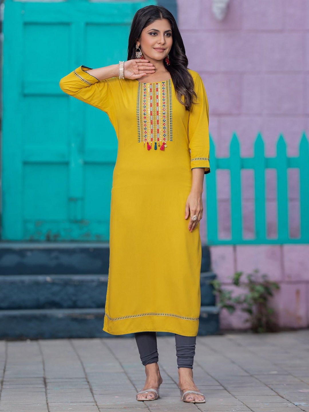 

MITTOO Yoke Design Round Neck Thread Work Kurta, Yellow