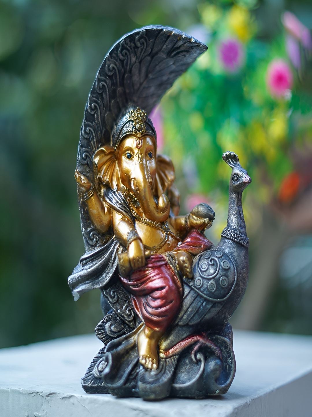 

Craftlayout Statue Gold-Toned Lord Ganesh Sitting On Peacock Religious Idol Showpiece