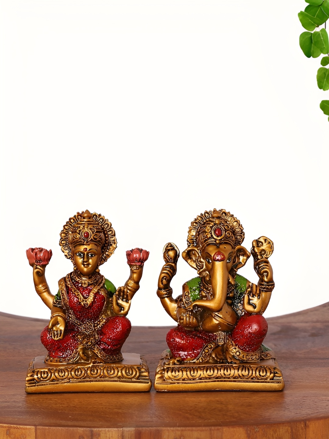 

INTERNATIONAL GIFT Gold-Toned God Ganesha And Godess Laxmi Religious Idol Showpiece
