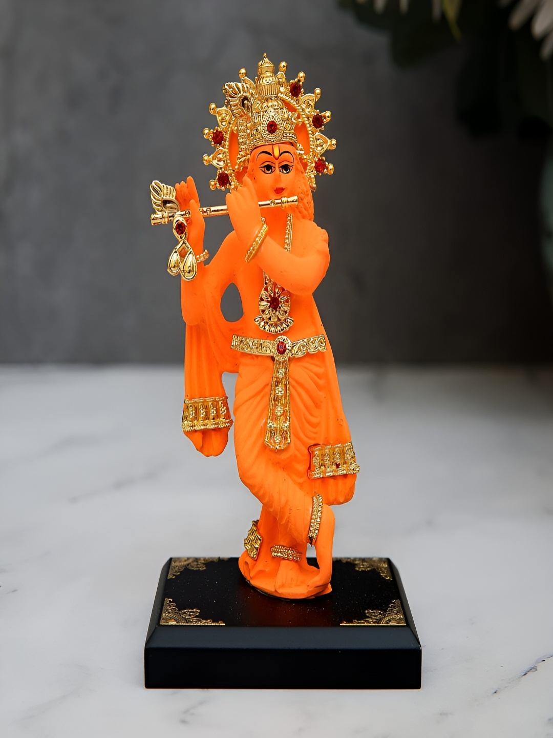 

Craftlayout Orange And Gold Toned Lord Krishna Religious Idol Resin Showpiece