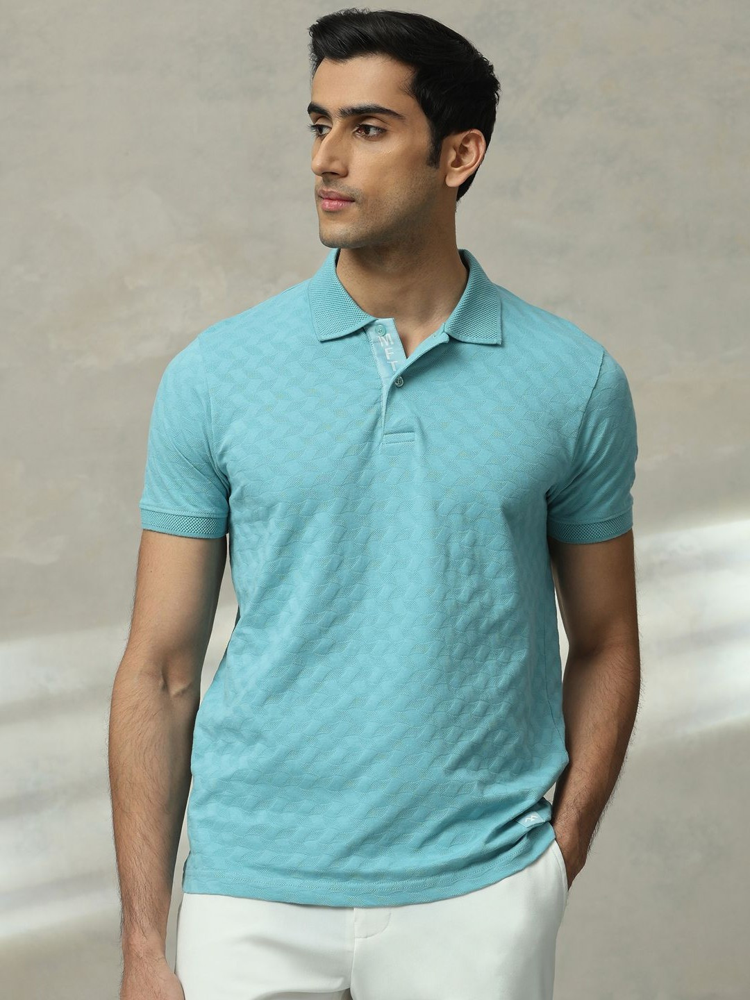 

Mufti Men Self Design Polo Collar Cotton Slim Fit T-shirt, Turquoise blue