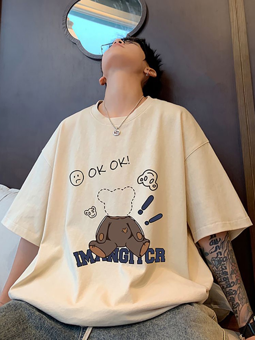 

StyleCast x Revolte Men Graphic Printed Round Neck Cotton Oversized T-shirt, Beige