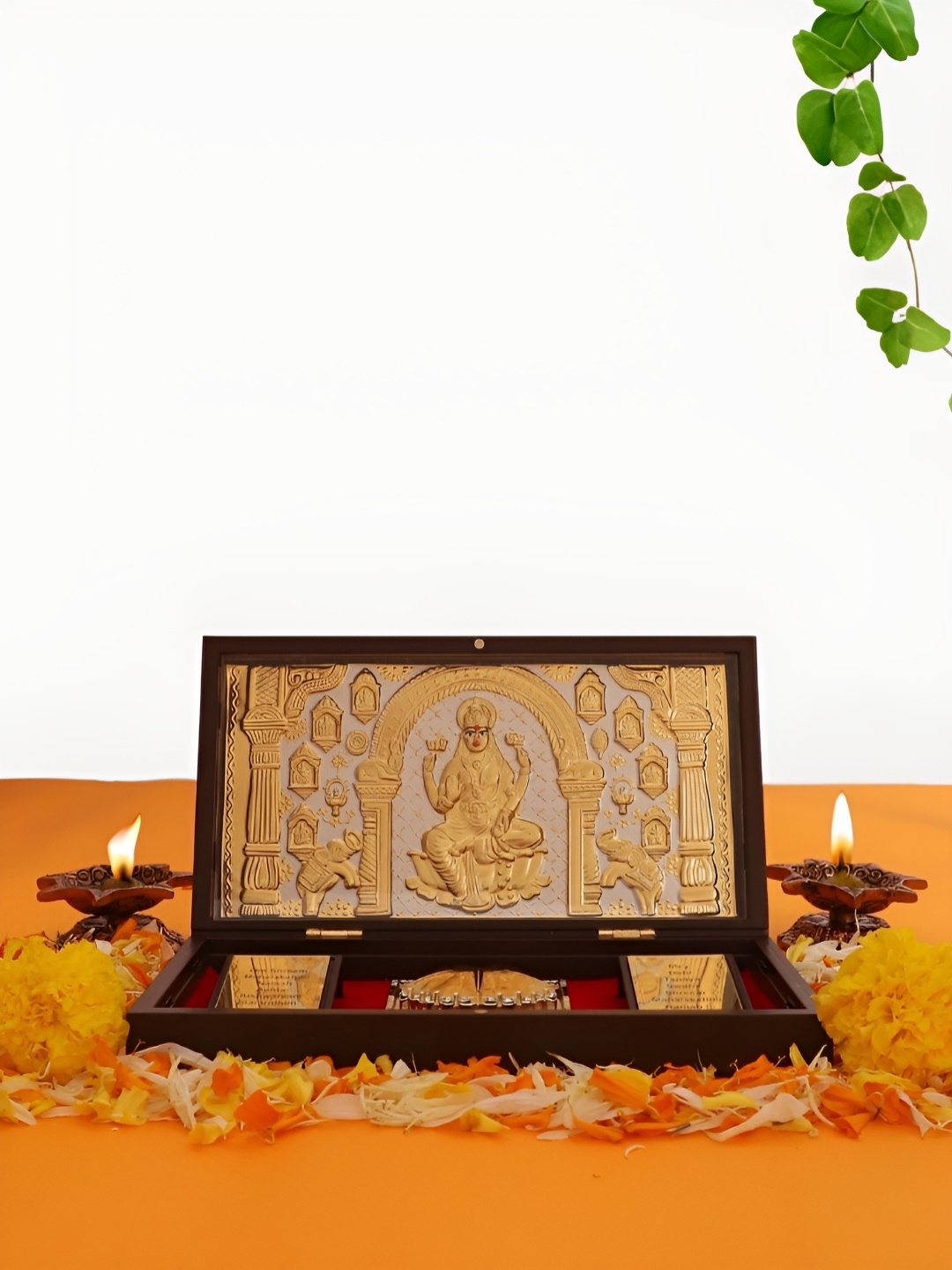 

INTERNATIONAL GIFT Gold-Toned Goddess Lakshmi Religious Idol Showpiece with Charan Paduka