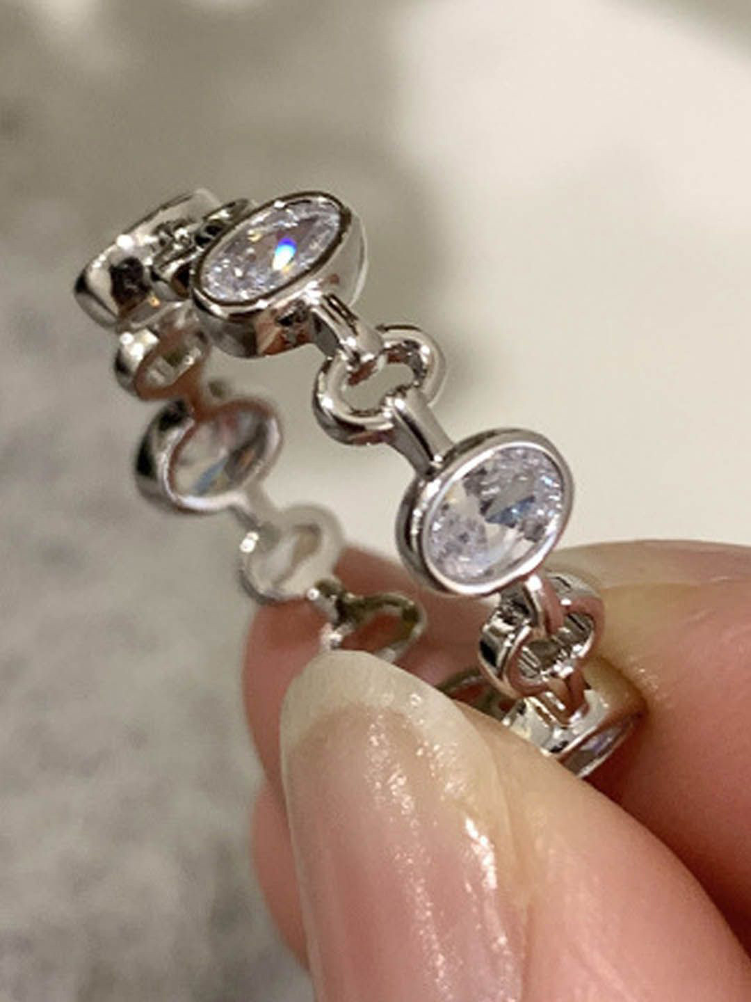

StyleCast Elegant Silver-Plated Artificial Stones Studded Round Shaped Finger Ring