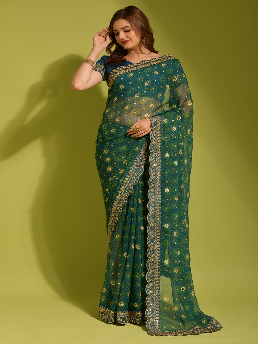 

Moda Rapido Embellished Sequinned Poly Georgette Bandhani Saree, Turquoise blue