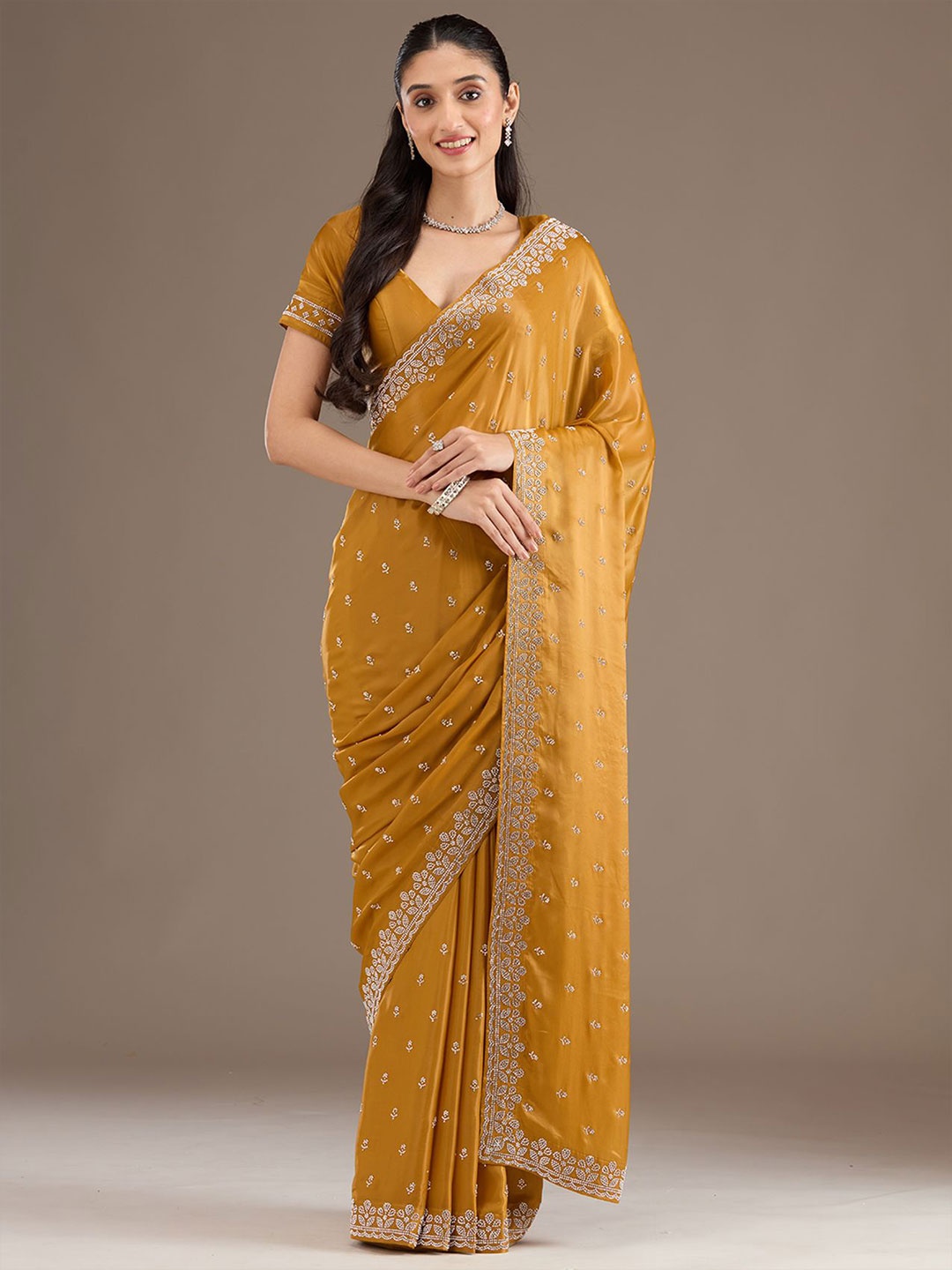 

Koskii Embellished Beads and Stones Satin Saree, Mustard