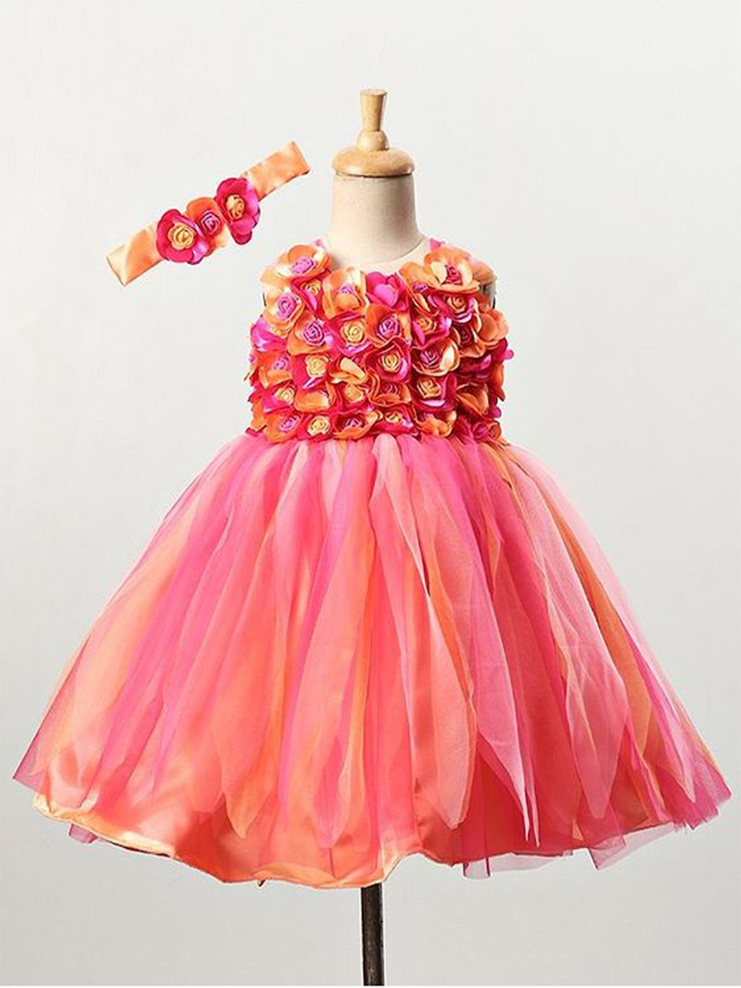 

Li & Li Boutique Girls Pink and Peach Flower Frock With Multi stripes