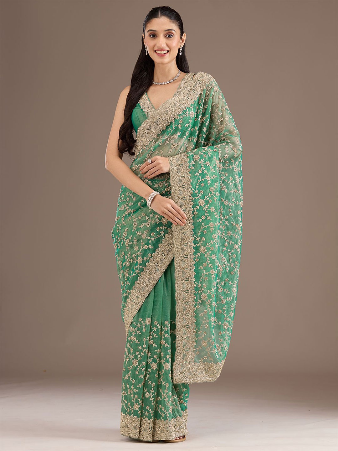 

Koskii Floral Beads and Stones Green Embellished Tissue Saree