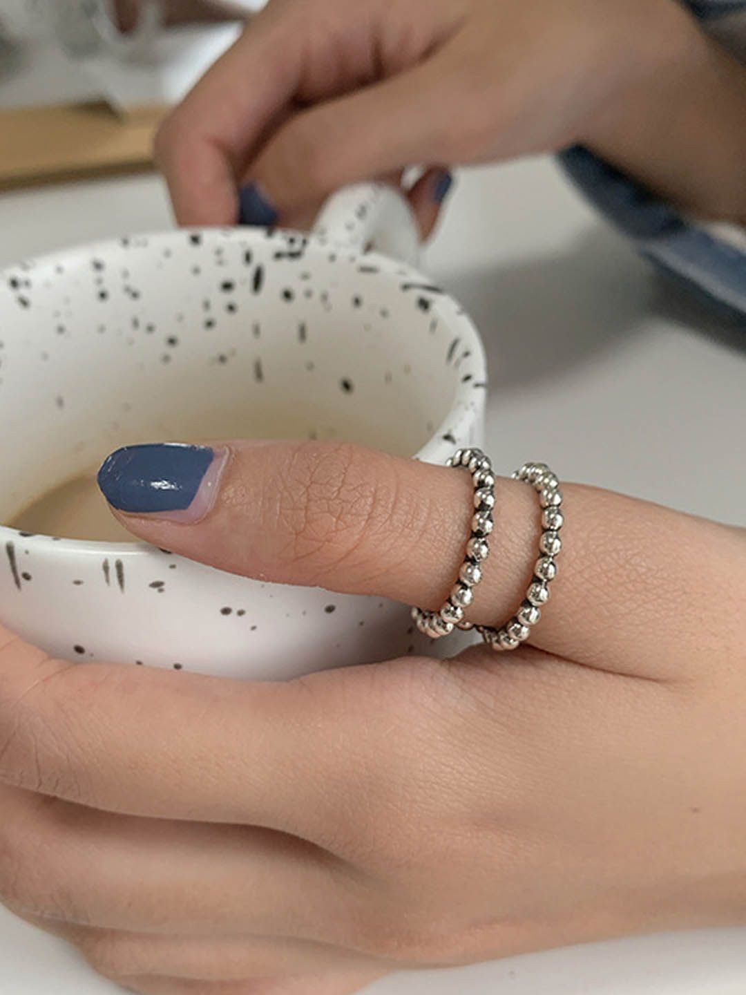 

StyleCast Silver-Toned Intricate Textured Adjustable Double-layered Finger Ring
