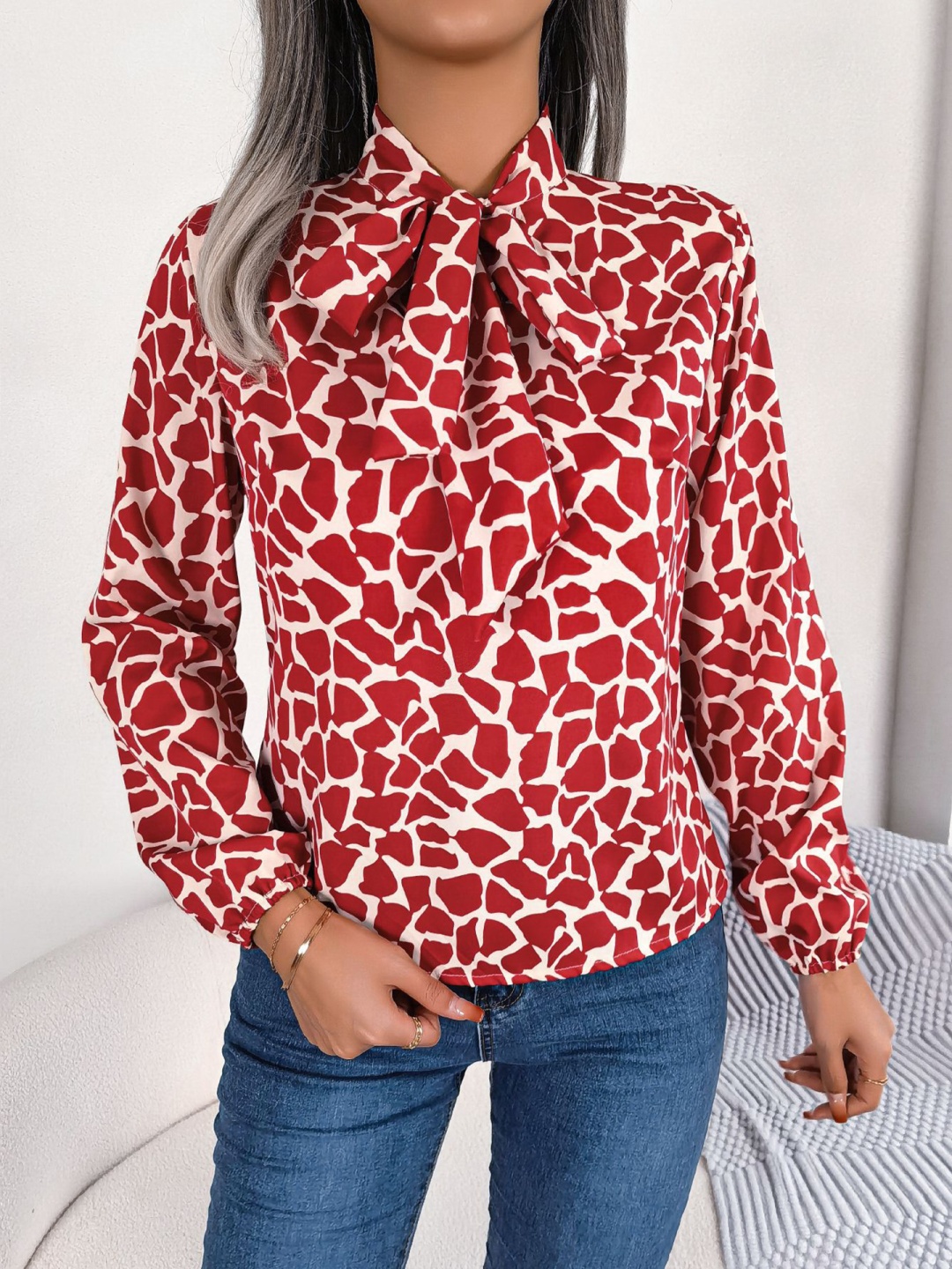 

StyleCast x Revolte Abstract Printed Tie-Up Neck Regular Top, Red