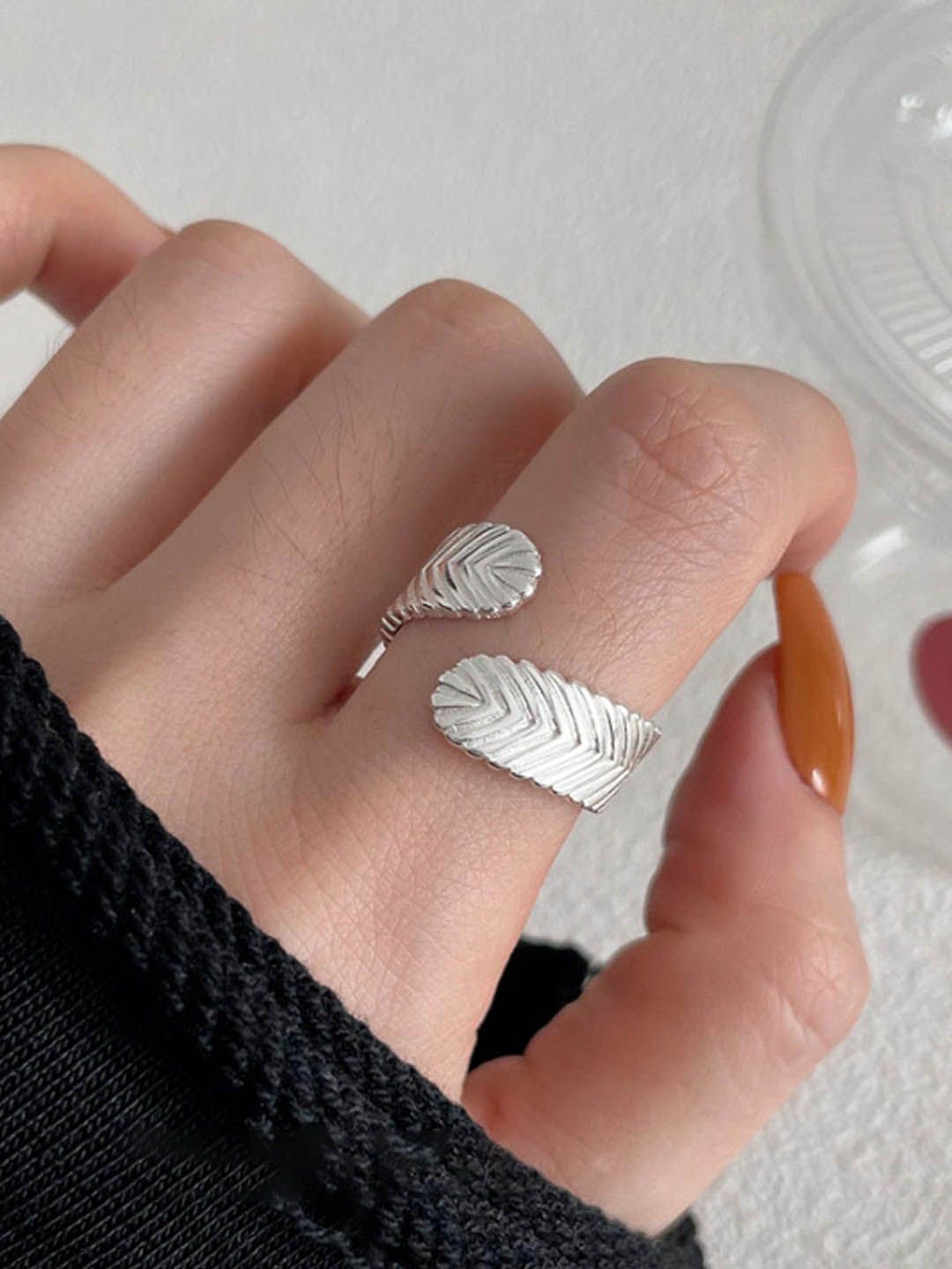 

StyleCast Silver-Plated Intricate Textured Round Shaped Adjustable Finger Ring