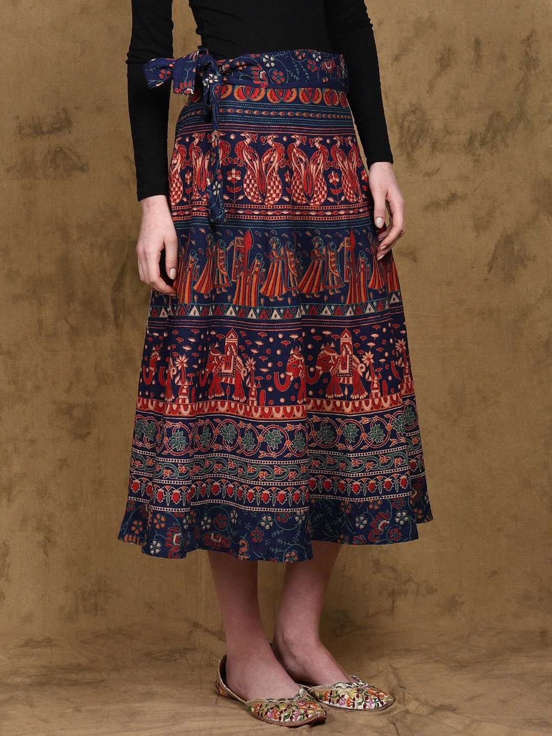 

Exotic India Medieval Blue Wrap Around Midi Skirt with Printed Procession