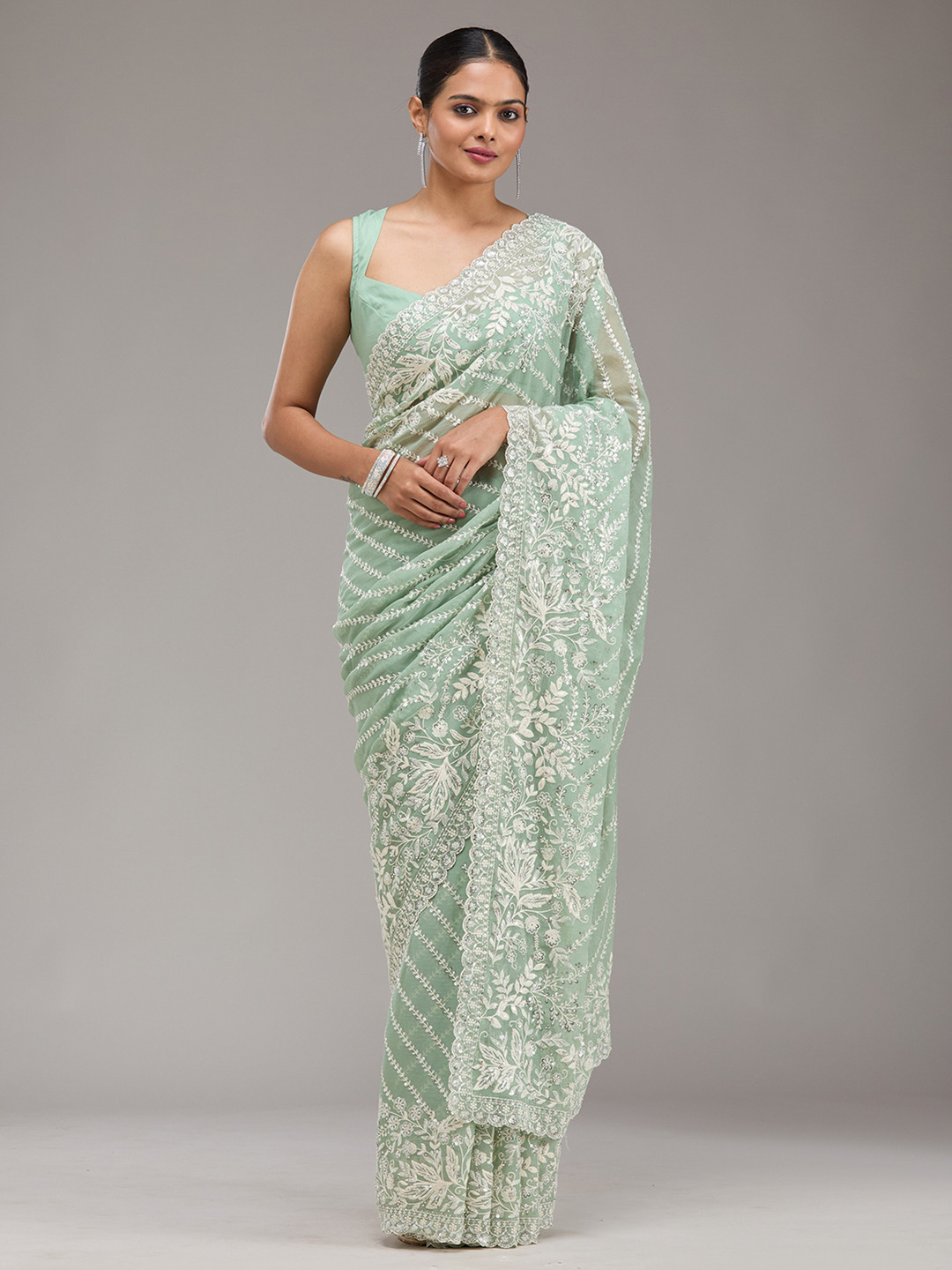 

Koskii Green Embellished Georgette Saree