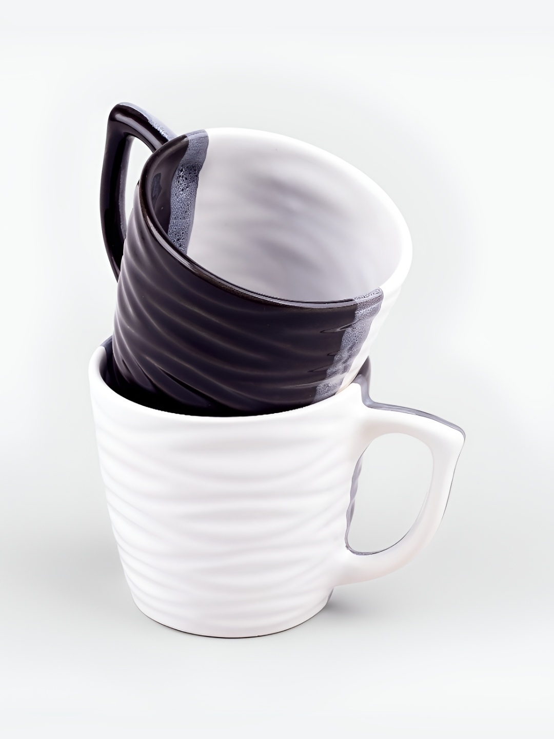 

Storepedia White & Black Textured Ceramic Glossy Cups Set of Cups and Mugs