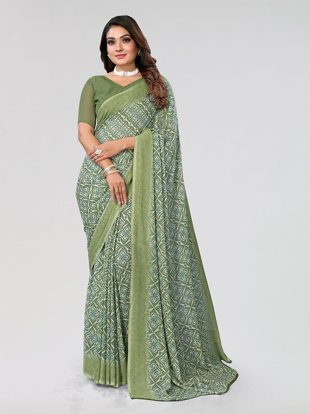 

Moda Rapido Abstract Printed Saree, Green